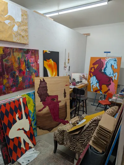 Colorful painted artwork in a Bozeman ArtLab studio